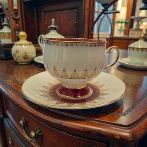 Rosina Elegant Gold and Burgundy Teacup and Saucer Set